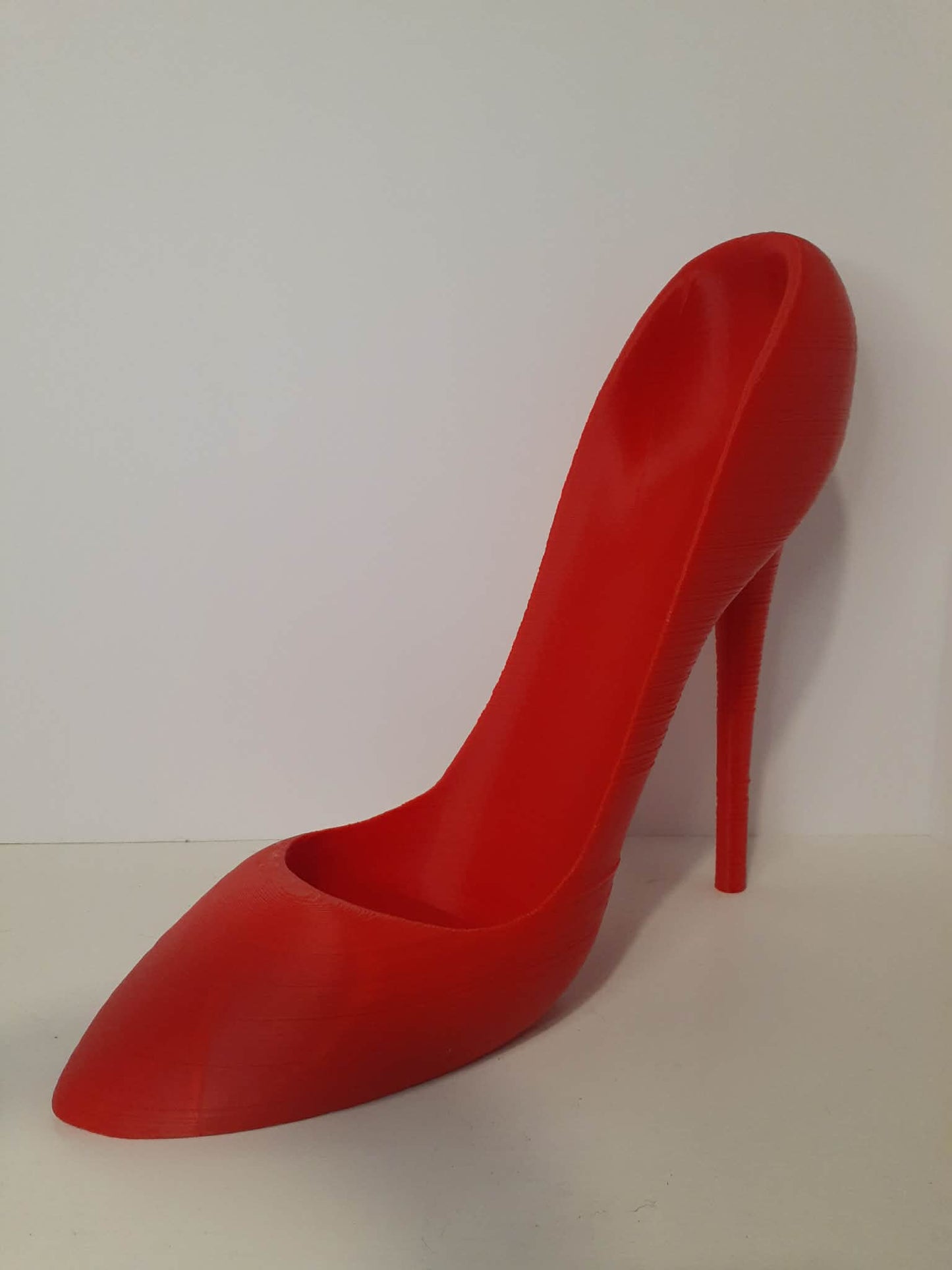 🍷 The High-Heel Wine Holder: Because Your Cabernet Deserves to Feel Sexy Too